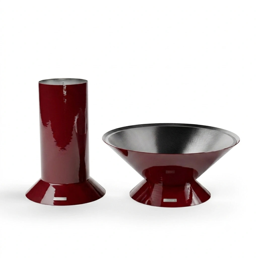 Vuuris Garnet outdoor fire pit on the large base (~36 inches), shown alongside the small base, illustrating the modular system in bordeaux porcelain enamel