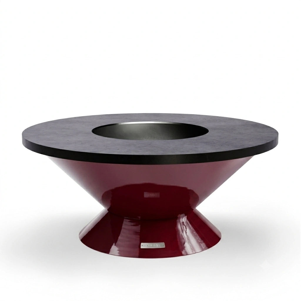 Vuuris Garnet outdoor fire pit in bordeaux porcelain enamel on the small base (~15 inches, lounge height) with the 8mm carbon steel cooking plate