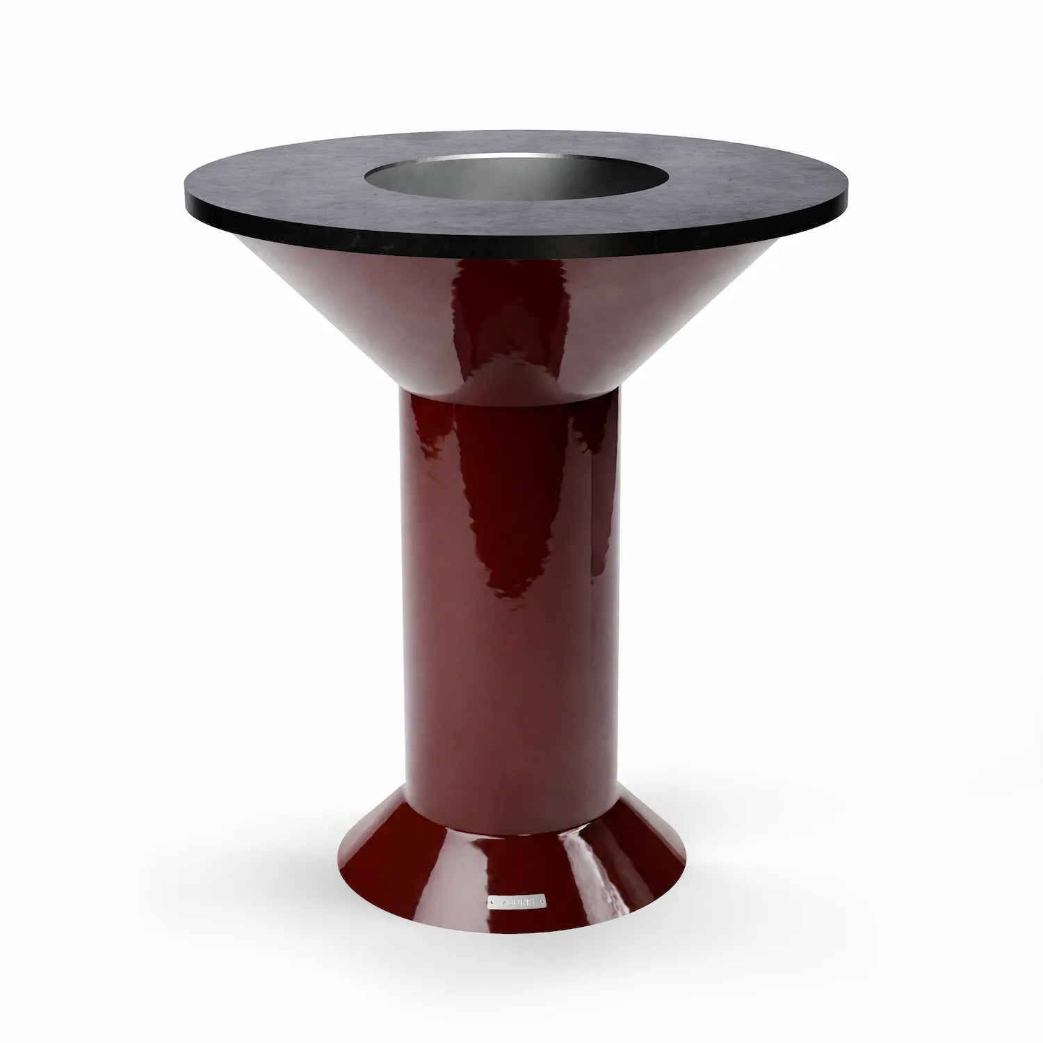 Vuuris Garnet outdoor fire pit centerpiece in bordeaux porcelain enamel, mounted on the large base at counter height with the 8mm carbon steel cooking plate